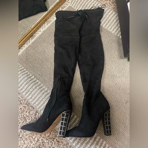 Brian Atwood boots worn twice. No tears or much west on them.Super comfortable.